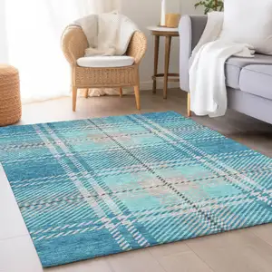 Photo of Teal Beige And Gray Plaid Washable Area Rug With UV Protection