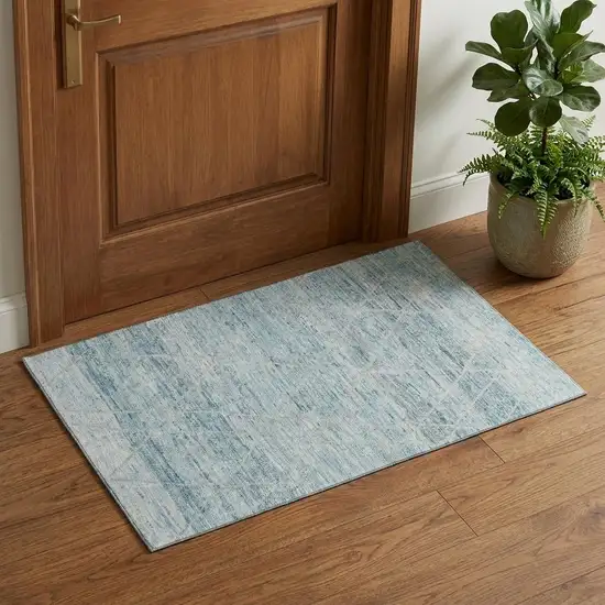 Teal Beige And Ivory Abstract Geometric Washable Area Rug With UV Protection Photo 1