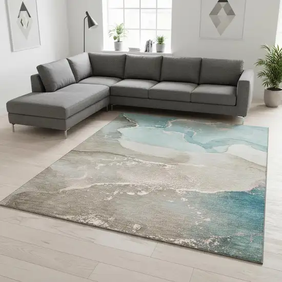 Teal Beige And Ivory Abstract Washable Area Rug With UV Protection Photo 1