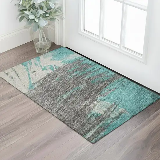 Teal Beige And Ivory Abstract Washable Area Rug With UV Protection Photo 2