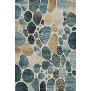 Photo of Teal Beige And Ivory Geometric Washable Area Rug With UV Protection
