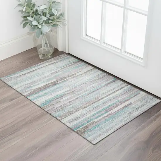 Teal Beige And Ivory Striped Washable Area Rug With UV Protection Photo 2
