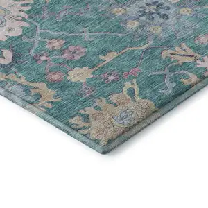 Photo of Teal Beige And Pink Floral Washable Area Rug With UV Protection