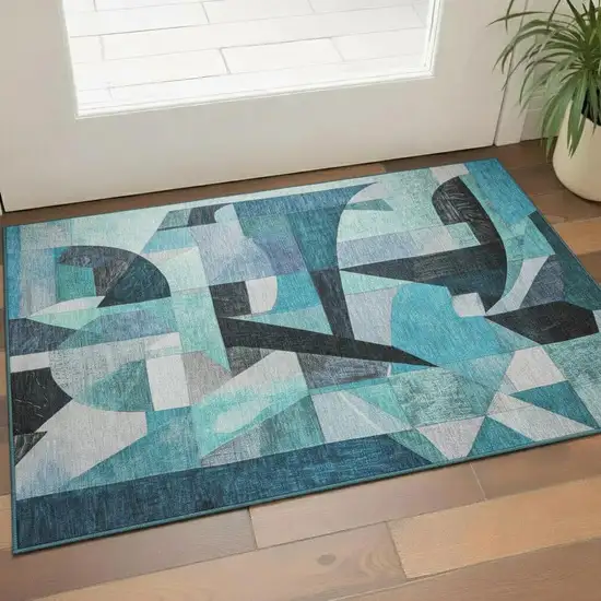 Teal Black And Blue Abstract Washable Area Rug With UV Protection Photo 2