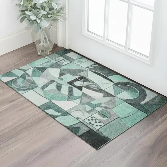 Teal Black And Ivory Abstract Washable Area Rug With UV Protection Photo 2
