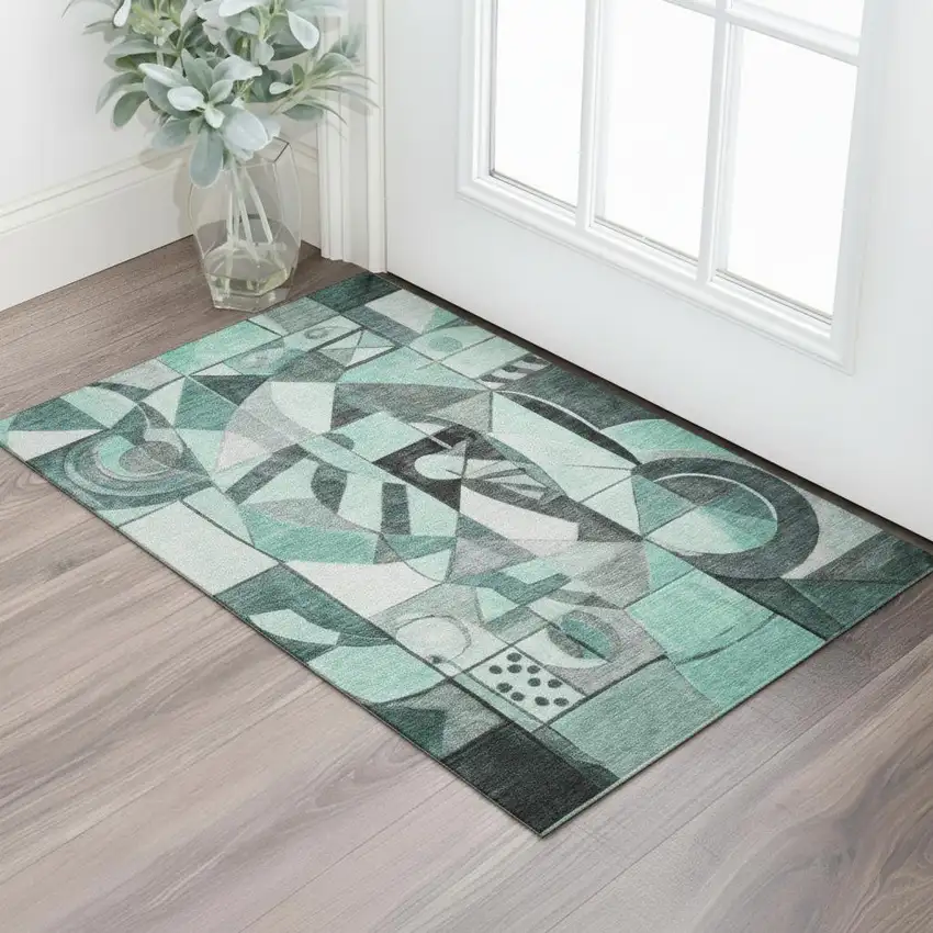 Teal Black And Ivory Abstract Washable Area Rug With UV Protection Photo 2