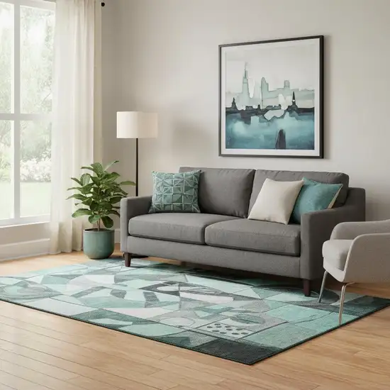 Teal Black And Ivory Abstract Washable Area Rug With UV Protection Photo 2