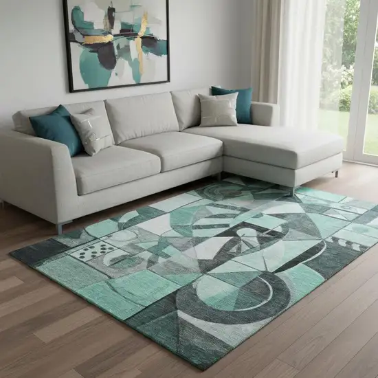Teal Black And Ivory Abstract Washable Area Rug With UV Protection Photo 2
