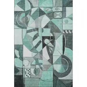 Photo of Teal Black And Ivory Abstract Washable Area Rug With UV Protection
