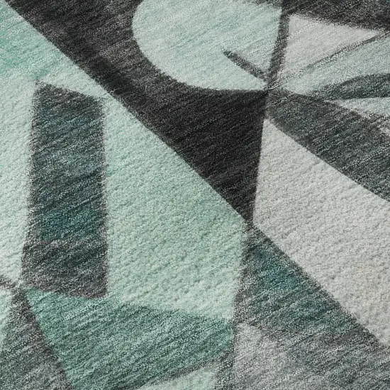 Teal Black And Ivory Abstract Washable Area Rug With UV Protection Photo 9