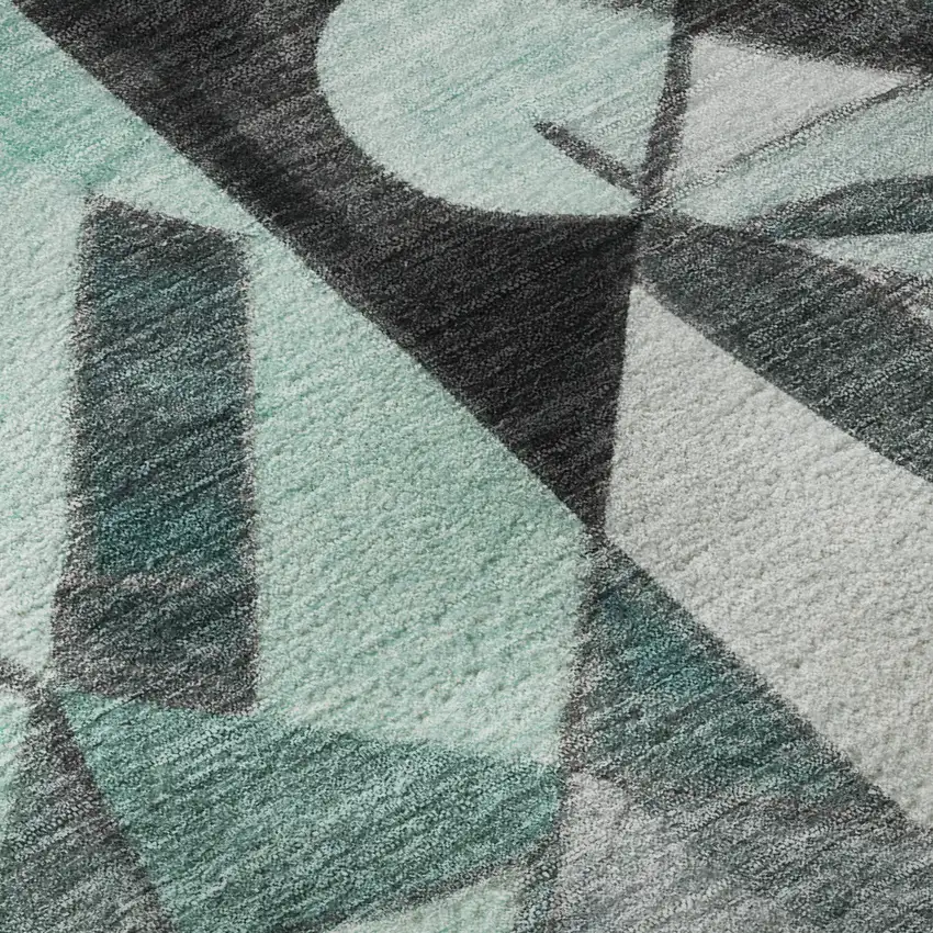 Teal Black And Ivory Abstract Washable Area Rug With UV Protection Photo 9