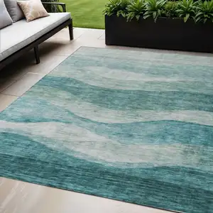 Photo of Teal Blue And Aqua Abstract Washable Indoor Outdoor Area Rug