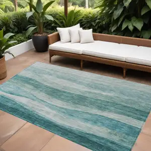 Photo of Teal Blue And Aqua Abstract Washable Indoor Outdoor Area Rug