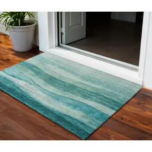 Photo of Teal Blue And Aqua Abstract Washable Indoor Outdoor Area Rug
