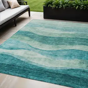 Photo of Teal Blue And Aqua Abstract Washable Indoor Outdoor Area Rug