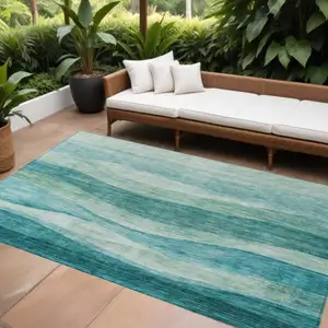 Photo of Teal Blue And Aqua Abstract Washable Indoor Outdoor Area Rug