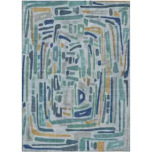 Photo of Teal Blue And Aqua Abstract Washable Indoor Outdoor Area Rug
