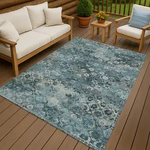 Photo of Teal Blue And Aqua Abstract Washable Indoor Outdoor Area Rug