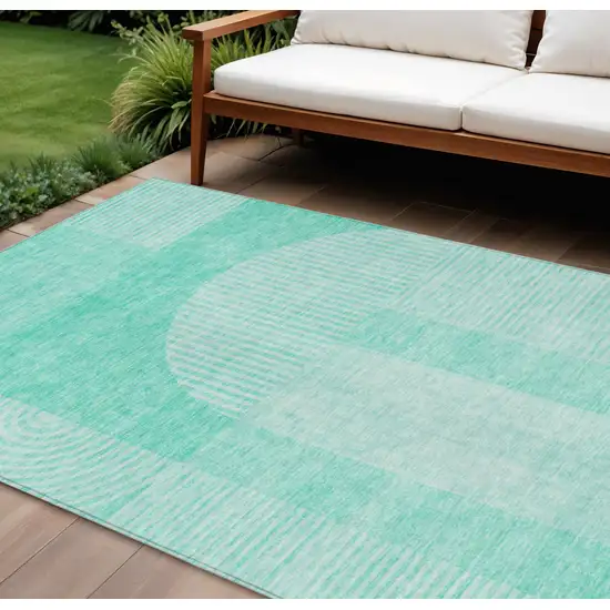 Teal Blue And Aqua Geometric Washable Indoor Outdoor Area Rug Photo 1