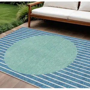 Photo of Teal Blue And Aqua Striped Washable Indoor Outdoor Area Rug