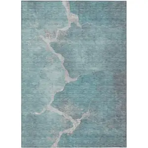 Photo of Teal Blue And Beige Abstract Washable Indoor Outdoor Area Rug