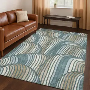 Photo of Teal Blue And Beige Abstract Washable Indoor Outdoor Area Rug