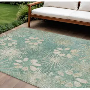 Photo of Teal Blue And Beige Floral Washable Indoor Outdoor Area Rug