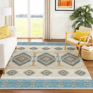 Photo of Teal Blue And Beige Southwestern Washable Indoor Outdoor Area Rug