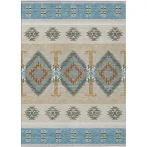 Photo of Teal Blue And Beige Southwestern Washable Indoor Outdoor Area Rug