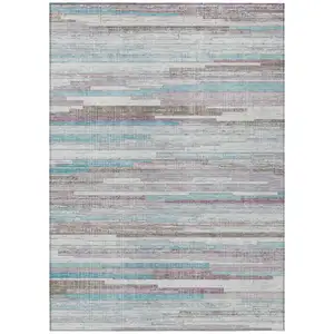 Photo of Teal Blue And Beige Striped Washable Indoor Outdoor Area Rug