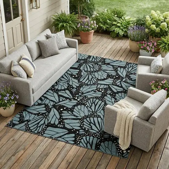 Teal Blue And Black Animal Print Washable Indoor Outdoor Area Rug Photo 1