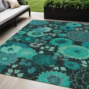 Photo of Teal Blue And Black Floral Washable Indoor Outdoor Area Rug
