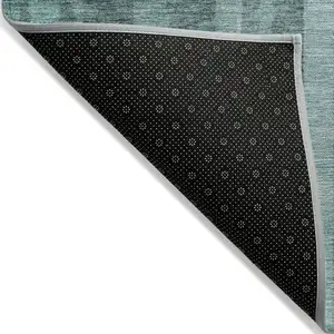Photo of Teal Blue And Black Striped Washable Indoor Outdoor Area Rug