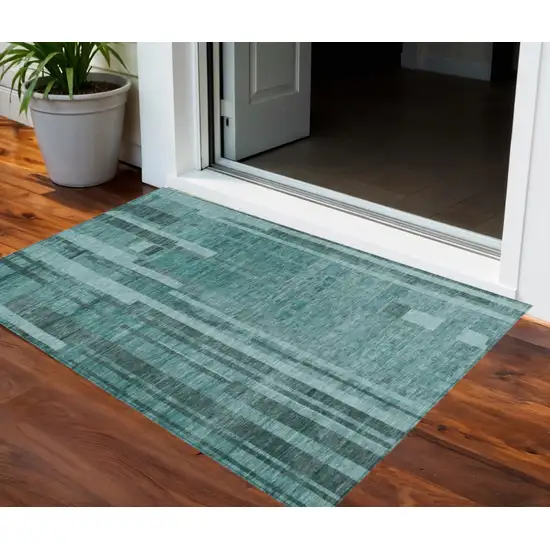 Teal Blue And Black Striped Washable Indoor Outdoor Area Rug Photo 1