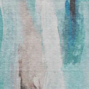 Photo of Teal Blue And Brown Abstract Washable Indoor Outdoor Area Rug