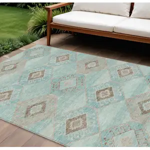 Photo of Teal Blue And Brown Aztec Washable Indoor Outdoor Area Rug