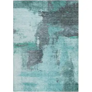 Photo of Teal Blue And Charcoal Abstract Washable Indoor Outdoor Area Rug