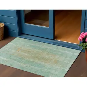 Photo of Teal Blue And Copper Abstract Washable Indoor Outdoor Area Rug