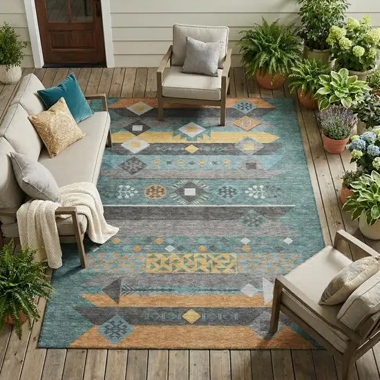 Teal Blue And Copper Geometric Washable Indoor Outdoor Area Rug Photo 1
