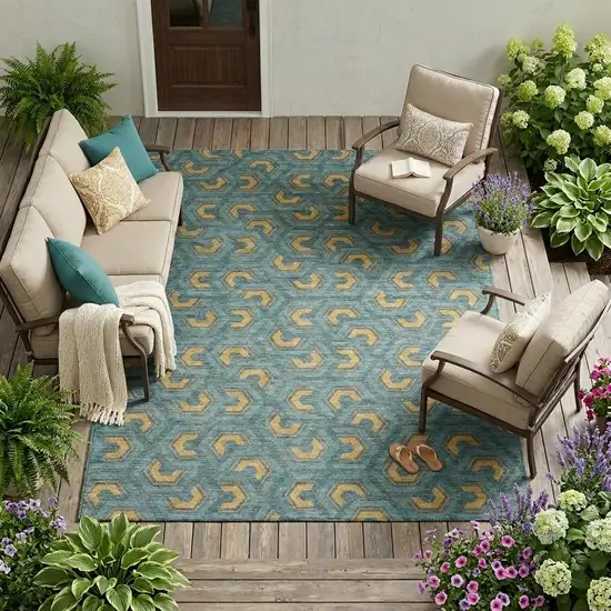 Teal Blue And Copper Geometric Washable Indoor Outdoor Area Rug Photo 1