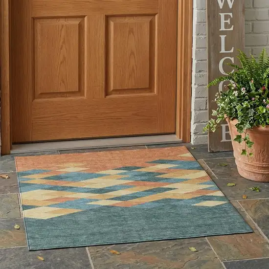 Teal Blue And Copper Geometric Washable Indoor Outdoor Area Rug Photo 1