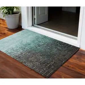 Photo of Teal Blue And Dark Gray Ombre Washable Indoor Outdoor Area Rug