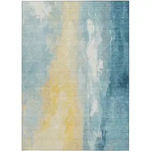 Photo of Teal Blue And Gold Abstract Washable Indoor Outdoor Area Rug
