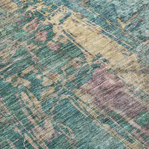 Photo of Teal Blue And Gold Abstract Washable Indoor Outdoor Area Rug