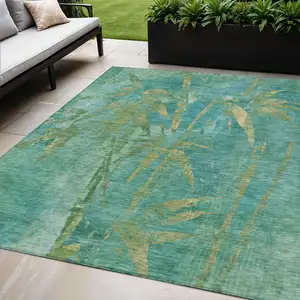 Photo of Teal Blue And Gold Botanical Leaves Washable Indoor Outdoor Area Rug