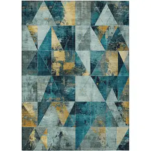 Photo of Teal Blue And Gold Geometric Washable Indoor Outdoor Area Rug