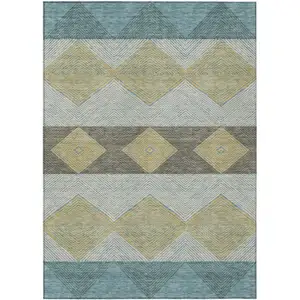 Photo of Teal Blue And Gold Geometric Washable Indoor Outdoor Area Rug