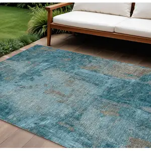 Photo of Teal Blue And Gray Abstract Washable Indoor Outdoor Area Rug