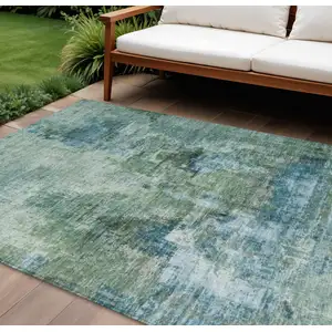 Photo of Teal Blue And Gray Abstract Washable Indoor Outdoor Area Rug