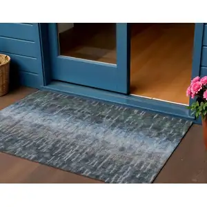 Photo of Teal Blue And Gray Abstract Washable Indoor Outdoor Area Rug